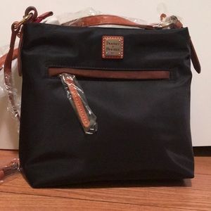 Brand new Dooney & Bourke Daisy Letter Carrier